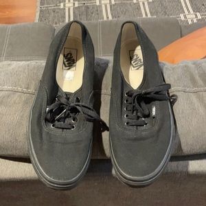 Mans black vans